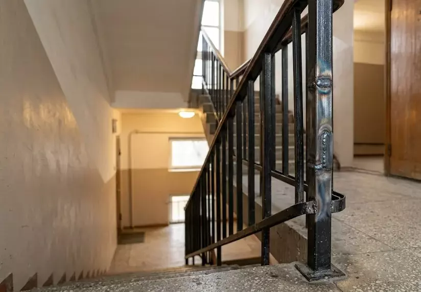 Repair of stair railing in the Nurly Tau residential complex