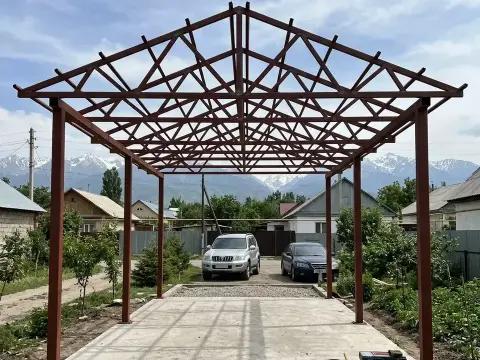 Welding of a car canopy frame in the Nauryzbai district